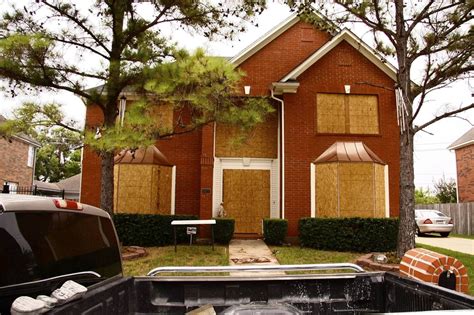 house boarded up with metal|should houses be boarded up.